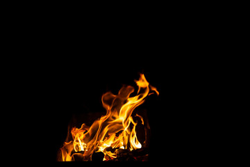 Danger fire on a dark background. Background from fire. Fire pattern can be used in design