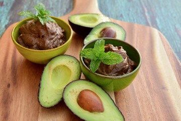 Vegan avocado chocolate mousse with mint leaf