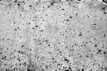 Fototapeta premium Texture of a concrete wall with cracks and scratches which can be used as a background