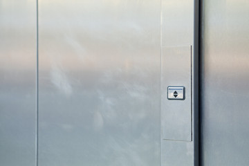 Metal doors with a button up and down.
