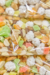 Dried fruits packed in transparent packaging.