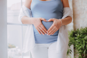 new life birth concept happy woman pregnancy female holding hands symbol heart white background