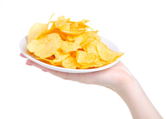 White plate of crisps snack in hand on white background isolation