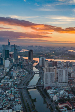 Vertical cityscape photo of Ho Chi Minh city at sunset
