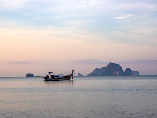 Traditional long tail boat on Ao Nang beach in Krabi Thailand