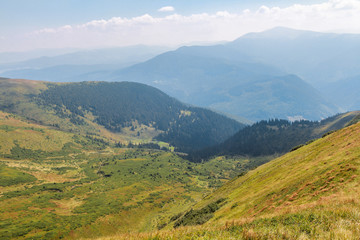 Fototapeta na wymiar Carpathian Mountains landscape in Dragobrat. Gendarmes mountains on the Svydovets ridge. The Svydovets is a mountain range in western Ukraine belonging to the Outer Eastern Carpathians. 