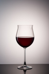  glass of wine on a light background for the menu1