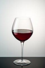  glass of wine on a light background for the menu
