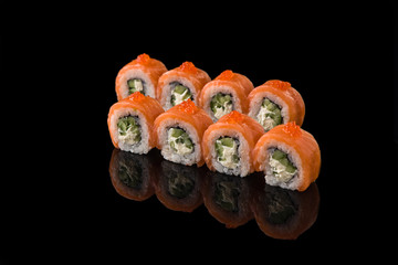  salmon rolls on a black background for a restaurant menu