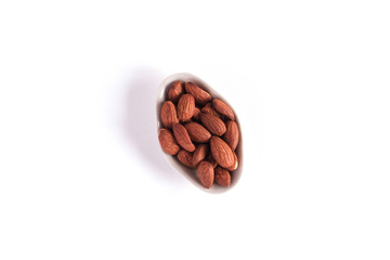 Obraz na płótnie Canvas Brown Almond nut isolated on white background