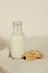 Breakfast set fresh milk and bread on canvas background