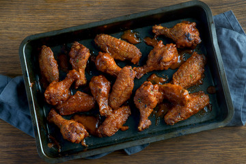 fried chicken wings on a baking sheet