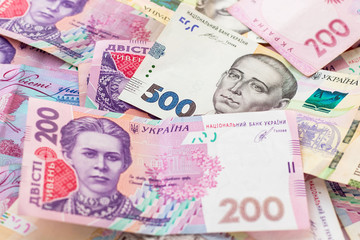 Ukrainian money, five hundred and two hundred hryvnias. National currency. Corruption in Ukraine. Business investment, finance, savings, banking and people concept. Close up.