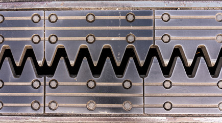 close up of the transition construction of bridge looking like teeth