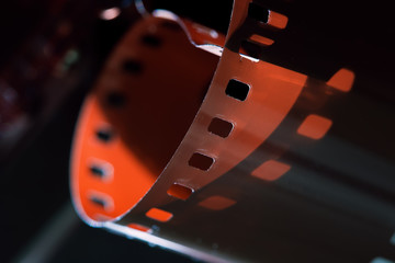 Photographic film close-up. Beautiful lighting. Shadows and relief of the film. Film Festival. The...