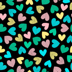 Hearts in doodle style. Seamless vector pattern in bright color palette.