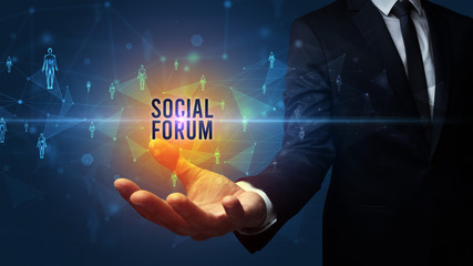 Elegant hand holding SOCIAL FORUM inscription, social networking concept