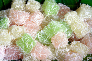 thai dessert with coconut on green banana leaf © Yanukit