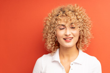 Fototapeta premium curly blonde girl closed her eyes