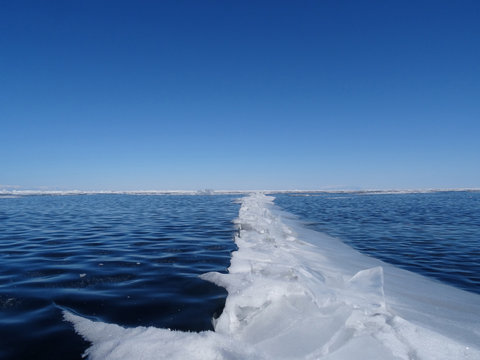 White Crack On The Dark Blue Ice Of Lake Baikal