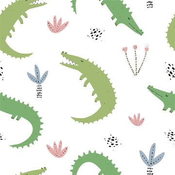 Vector color hand-drawn seamless repeating childish pattern with cute green crocodiles, palm trees and plants in Scandinavian style on a white background. Seamless pattern with crocodiles. Baby animal