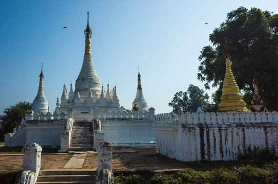 White and golden pagodas in Inwa (Ava), Myanmar