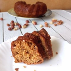  a piece of homemade Carrot pie with nuts on a white plate
