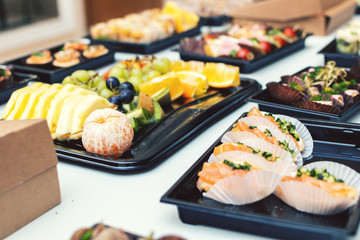 Buffet table with fruits and various kind of food. Business meeting.