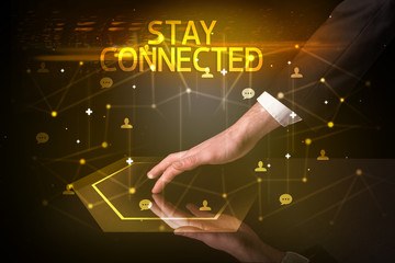 Navigating social networking with STAY CONNECTED inscription, new media concept