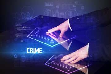 Hand touching digital table with CRIME inscription, new age security concept