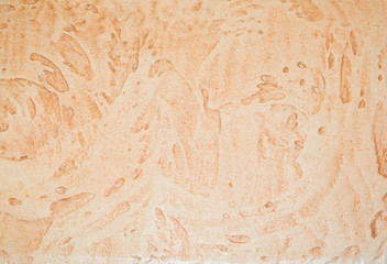 Fototapeta na wymiar Decorative plaster on the wall as a background