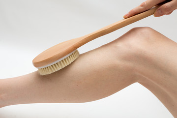dry massage with a hard brush.  body care