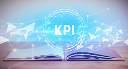 Open book with KPI abbreviation, modern technology concept