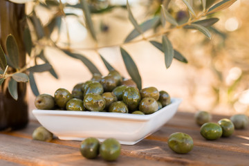 olives on table in an olive grove