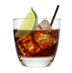 Vanilla vodka, rum or Cuba Libre with lime and cola in glass isolated on white background