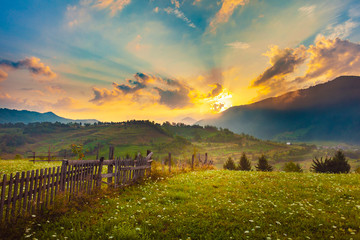 Fototapeta na wymiar Simple sunrise landscape on the hills