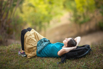 Hiker girl in beautiful natural setting, freedom, adventure concept