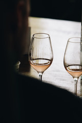 White and rose wine tasting close up view. Drop wine carafe.