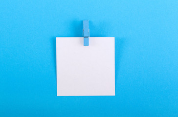 Paper note with clothespin
