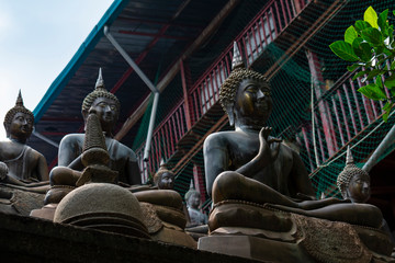 Sri Lanka, Colombo, Gangaramaya temple - December 31 2019 - The seated Buddhas