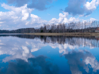 the view of the calm lake, the blue sky