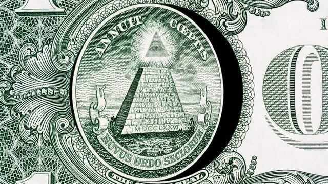 Creative 4k parallax video of details of a 1 American dollar banknote with a rotating circle with a pyramid and an eye at the top.