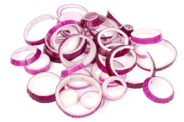 Sliced red onion rings on a wooden kitchen board