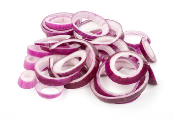 Sliced red onion rings on a wooden kitchen board