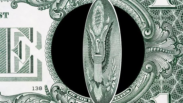 Creative 4k parallax video details of a 1 american dollar banknote with a rotating eagle close-up. One US dollar bill macro view.
