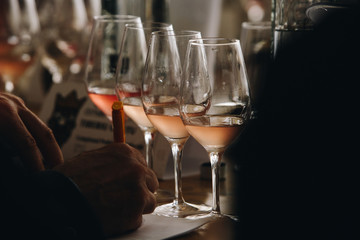 White, red and rose wine tasting close up view. Drop wine carafe.