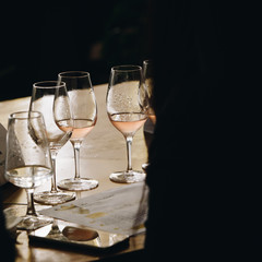 White, red and rose wine tasting close up view. Drop wine carafe.