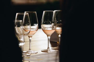 White, red and rose wine tasting close up view. Drop wine carafe.