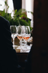 White, red and rose wine tasting close up view. Drop wine carafe.