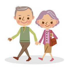 手をつないで歩く老夫婦